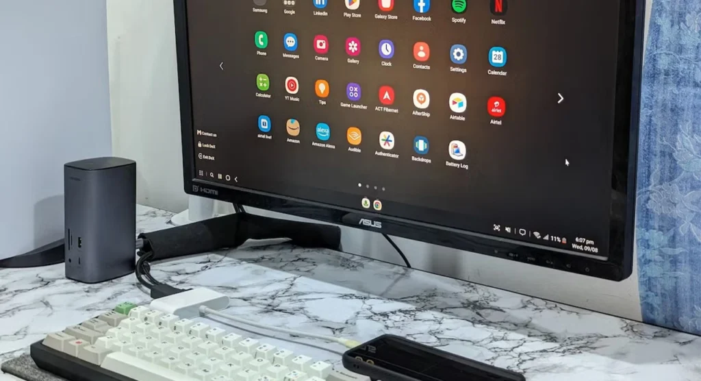 Samsung DeX introduction image showcasing smartphone turned into a desktop experience with a monitor, keyboard, and mouse.