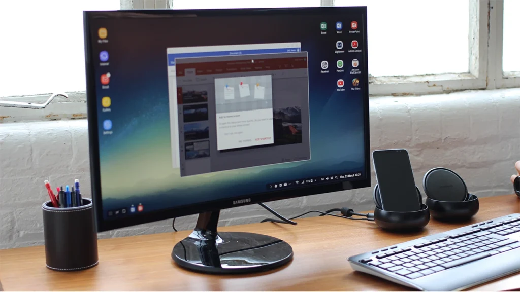 Samsung DeX transforms a smartphone into a desktop experience with a larger screen, keyboard, and mouse for productivity.
