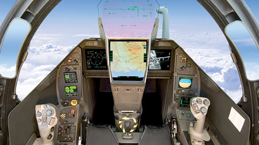 Inside the Rafale cockpit, displaying radar screens, navigation systems, and avionics controls