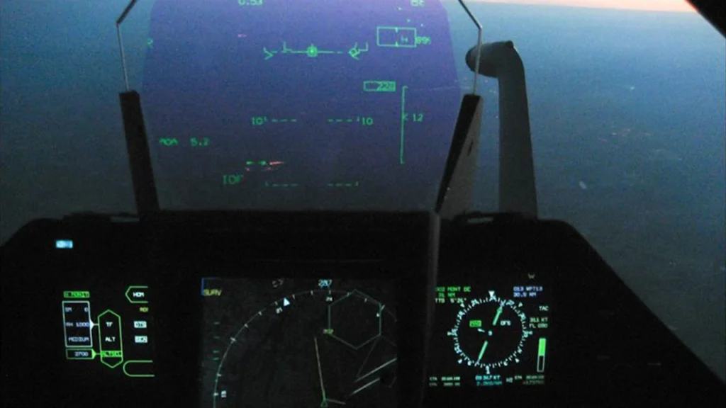 Rafale jet cockpit featuring heads-up display (HUD), touchscreen panels, and voice-command systems
